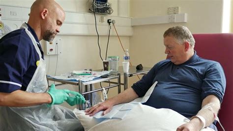 Devon patient receives personalised cancer vaccine .